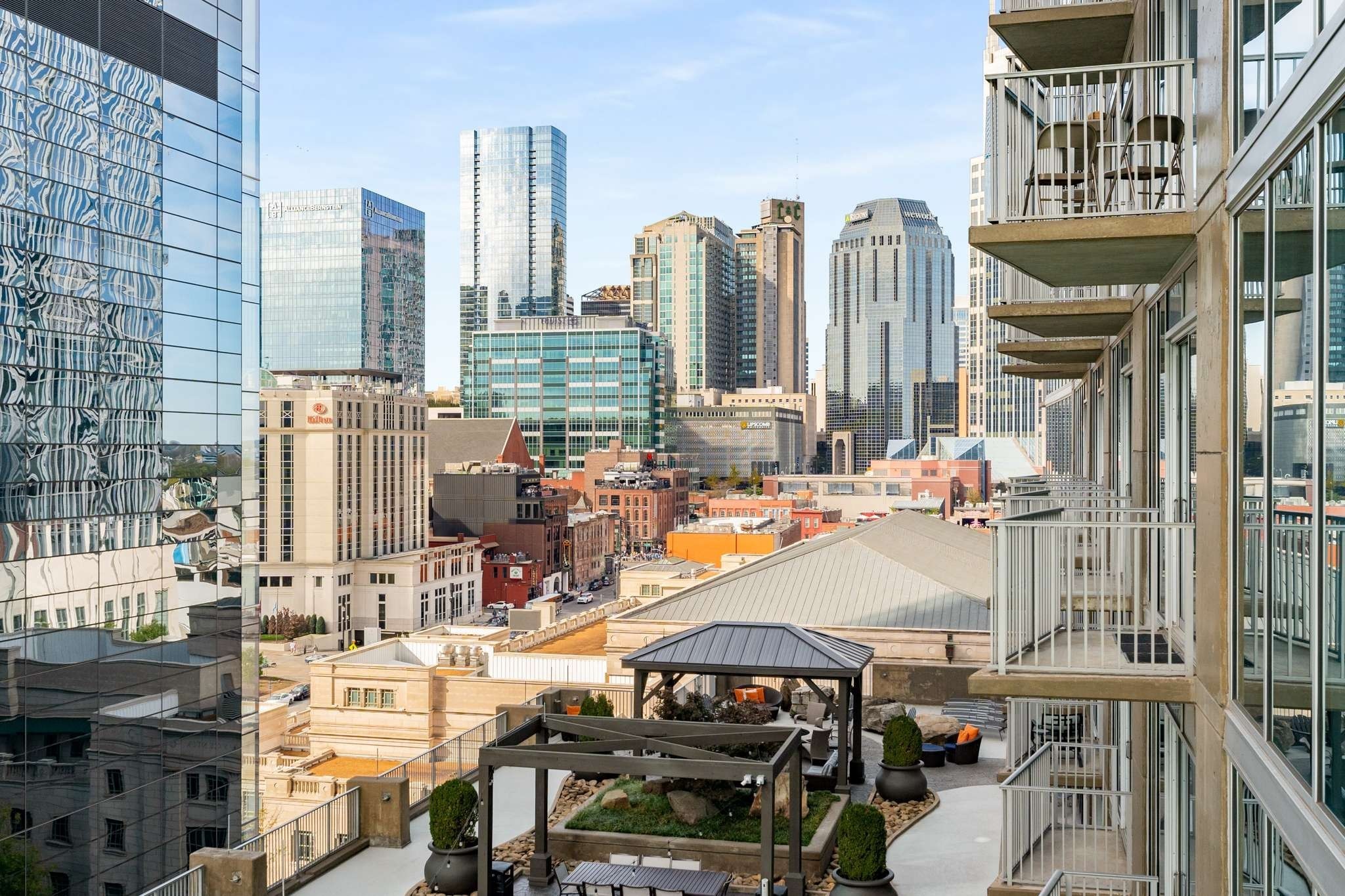 a view of city with tall buildings