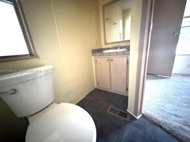 4510 Welcome Drive Sebring, FL 33870 - Photo 6 of 28 a bathroom with a sink and a toilet