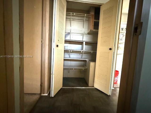 4510 Welcome Drive Sebring, FL 33870 - Photo 10 of 28 a storage room with wooden floor