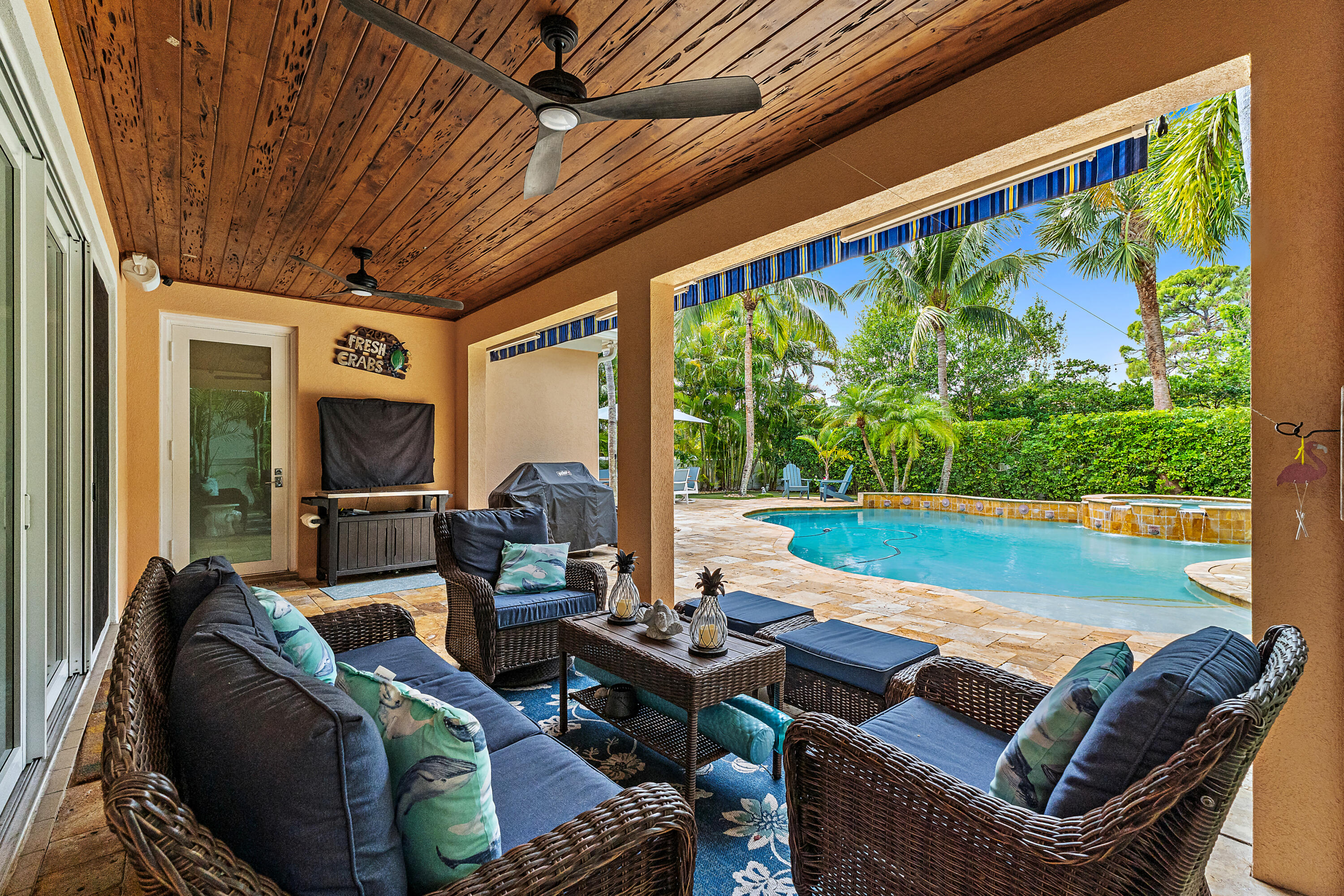 338 Caravelle Drive Jupiter, FL 33458 - Photo 28 of 97 a outdoor living space with furniture and garden view