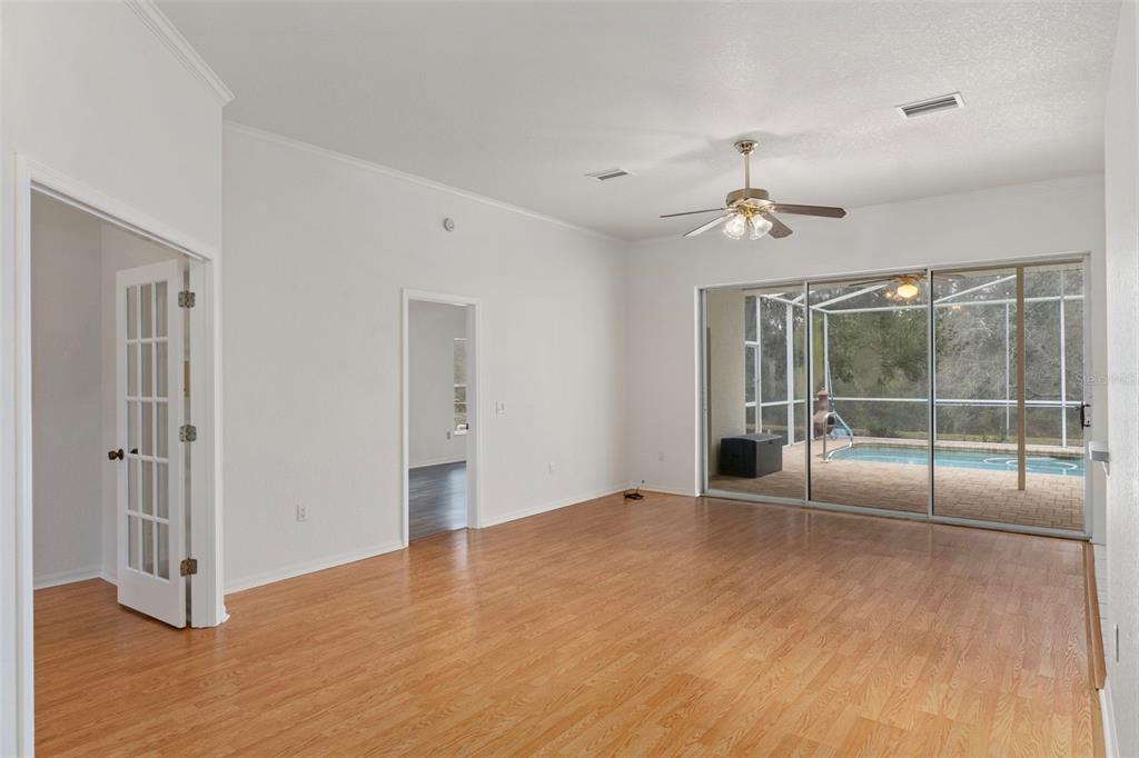 2214 Meadow Lark Road Spring Hill, FL 34608 - Photo 11 of 49 a view of an empty room with a window