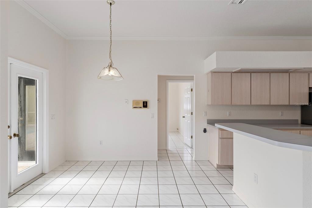2214 Meadow Lark Road Spring Hill, FL 34608 - Photo 17 of 49 a view of a kitchen with a sink cabinets and window