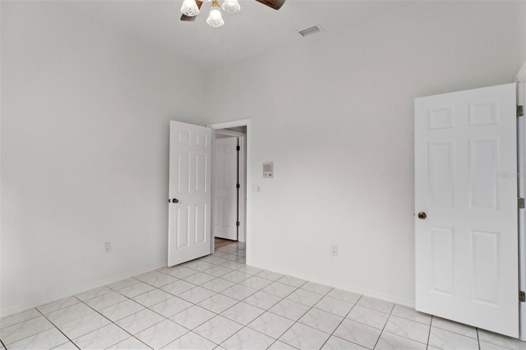 2214 Meadow Lark Road Spring Hill, FL 34608 - Photo 31 of 49 a view of an empty room