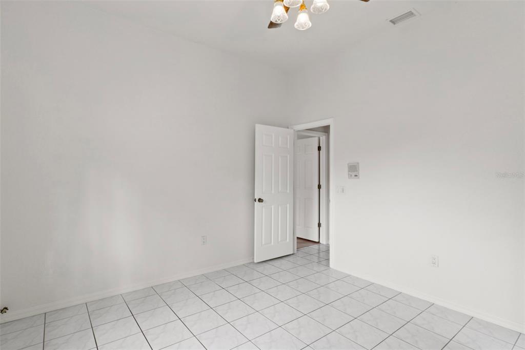 2214 Meadow Lark Road Spring Hill, FL 34608 - Photo 32 of 49 a view of an empty room