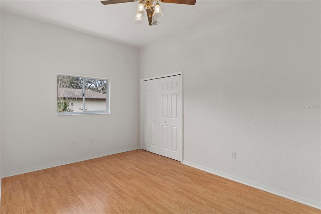 2214 Meadow Lark Road Spring Hill, FL 34608 - Photo 33 of 49 a view of an empty room with a window