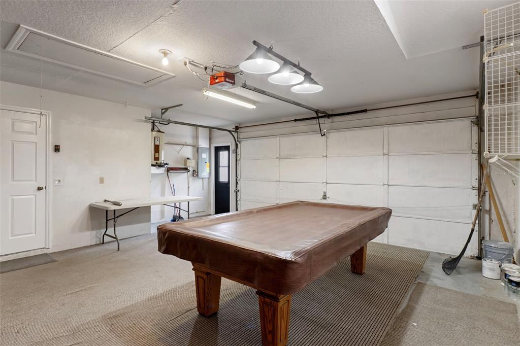 2214 Meadow Lark Road Spring Hill, FL 34608 - Photo 36 of 49 a view of a dining room with furniture