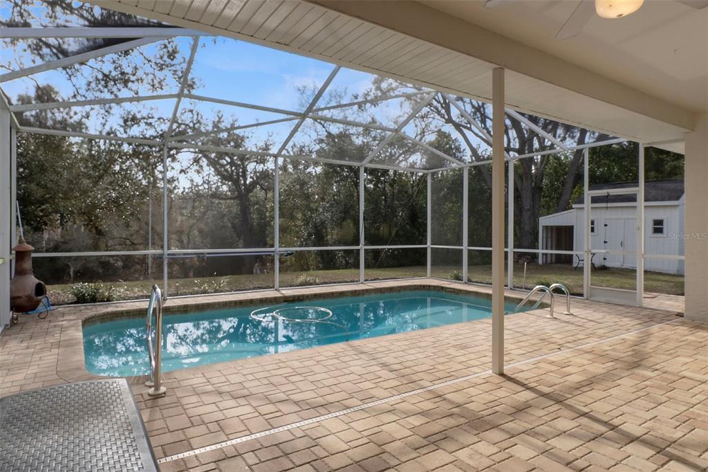 2214 Meadow Lark Road Spring Hill, FL 34608 - Photo 38 of 49 a view of a backyard