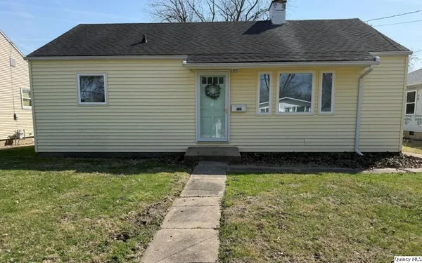 a front view of house with yard