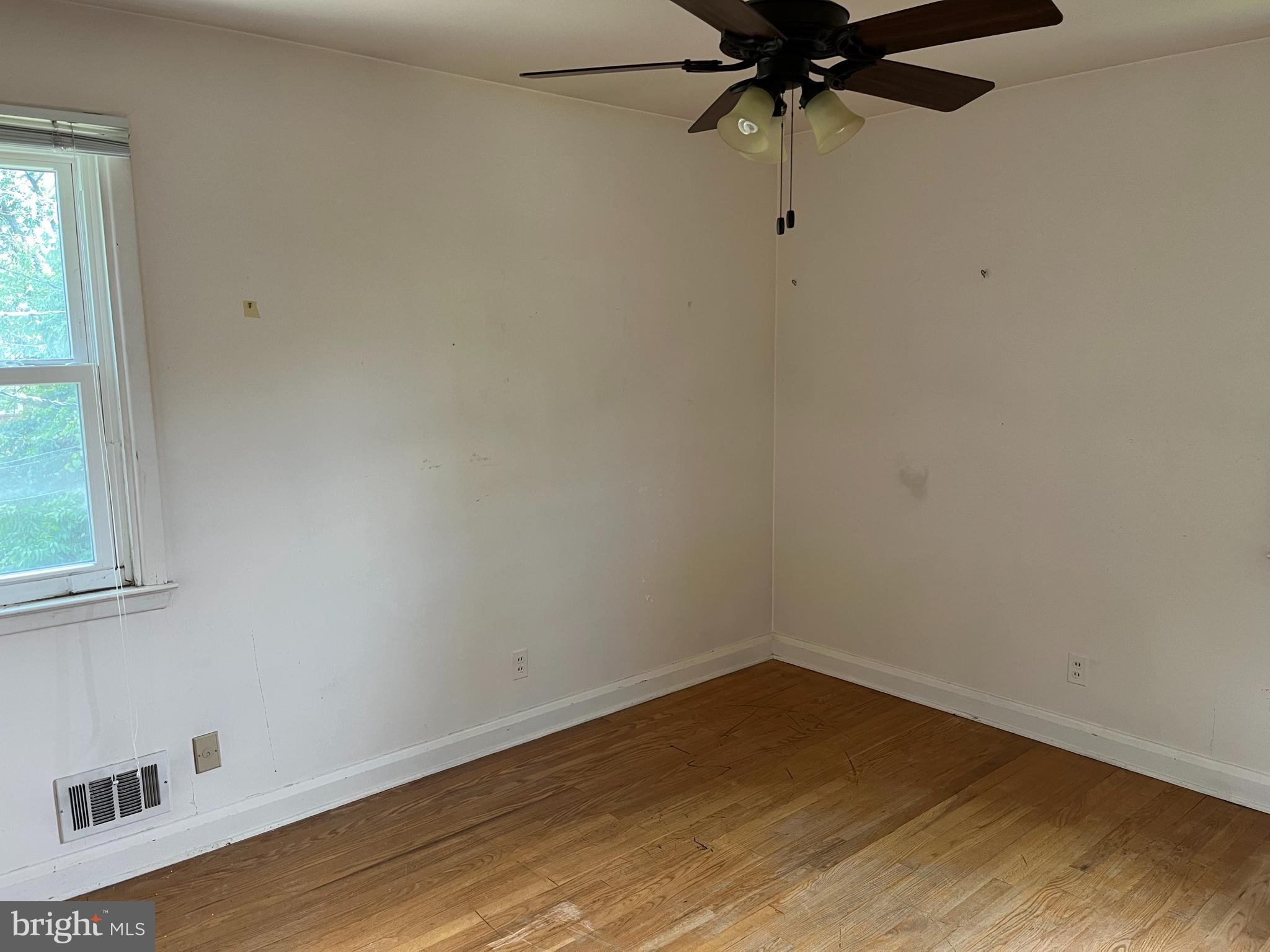 3109 Northbrook Road Baltimore, MD 21208 - Photo 13 of 23 a view of a room with wooden floor and cabinet
