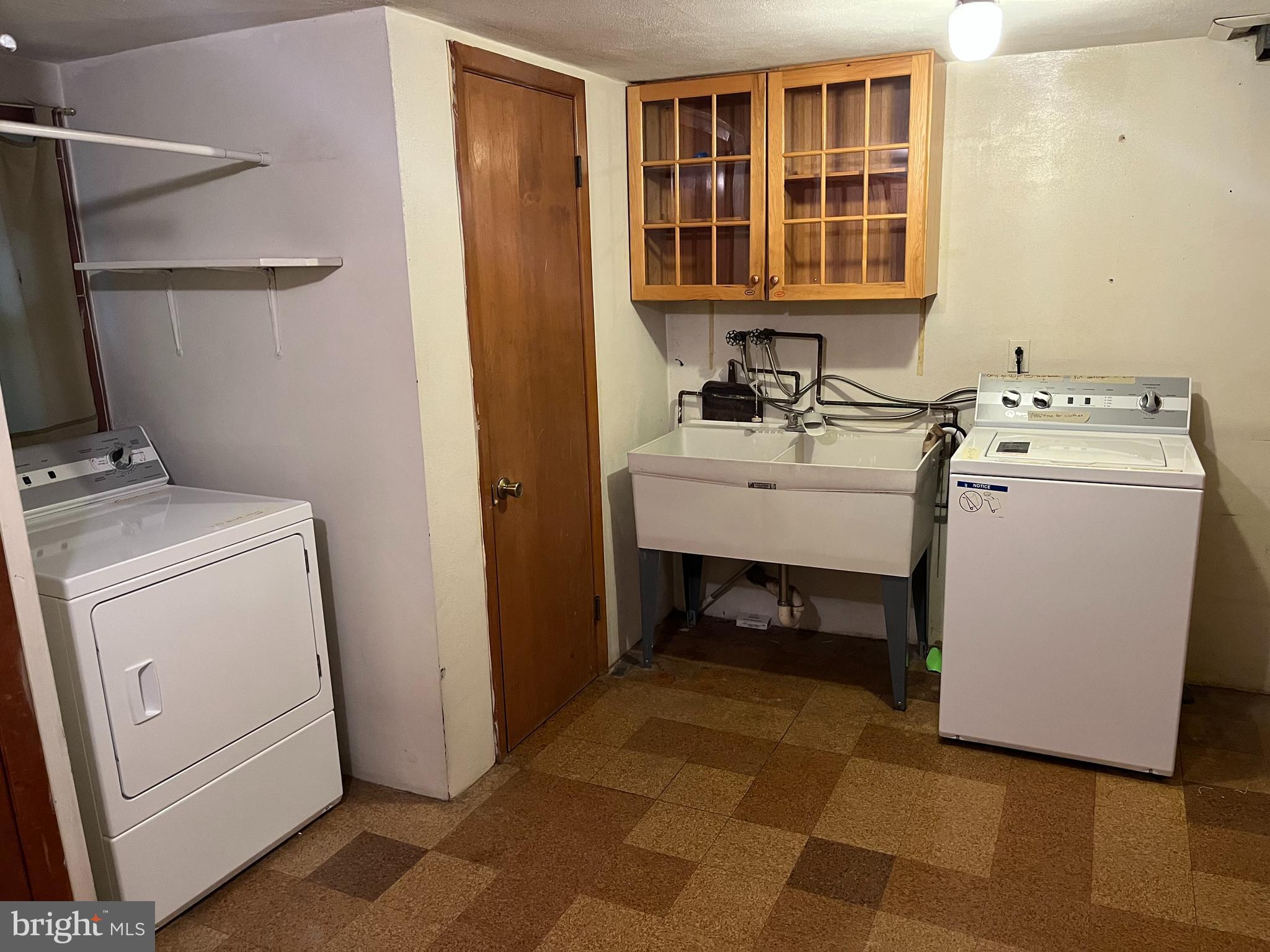 3109 Northbrook Road Baltimore, MD 21208 - Photo 18 of 23 a utility room with dryer and washer