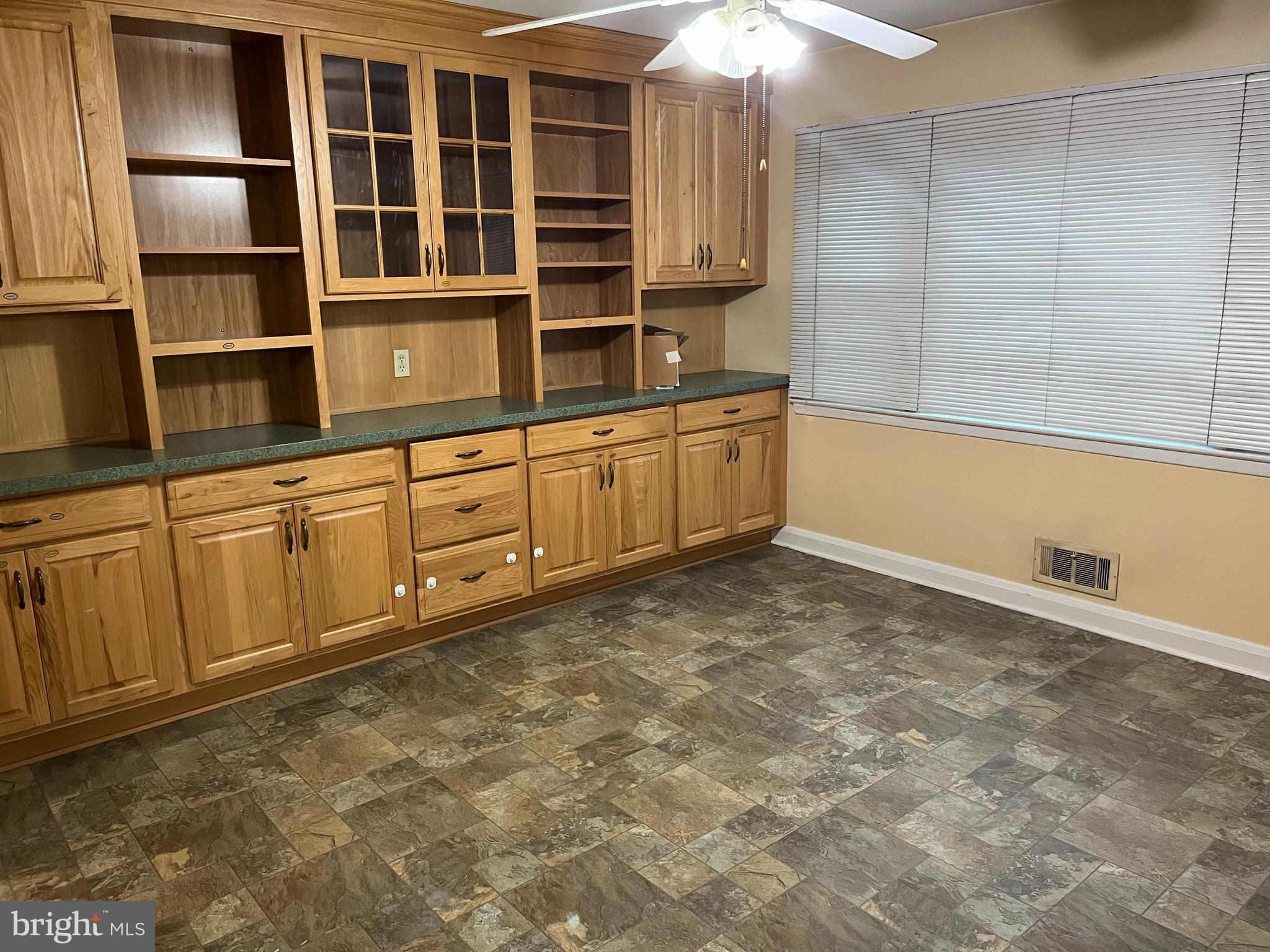 3109 Northbrook Road Baltimore, MD 21208 - Photo 4 of 23 a view of a kitchen with cabinets