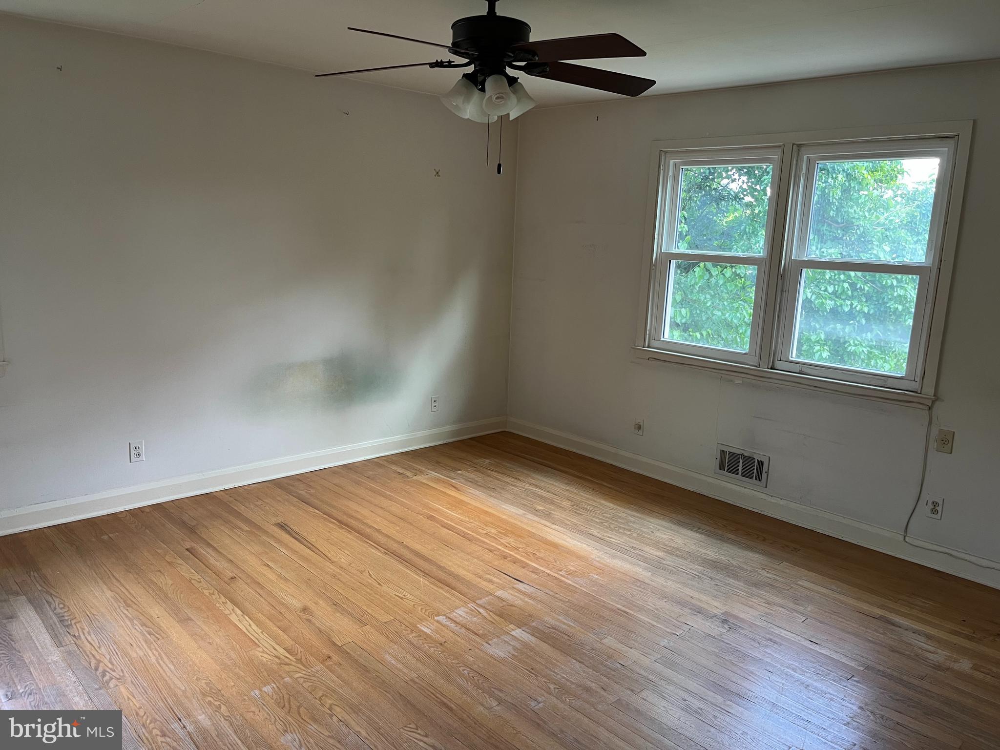 3109 Northbrook Road Baltimore, MD 21208 - Photo 8 of 23 an empty room with a window