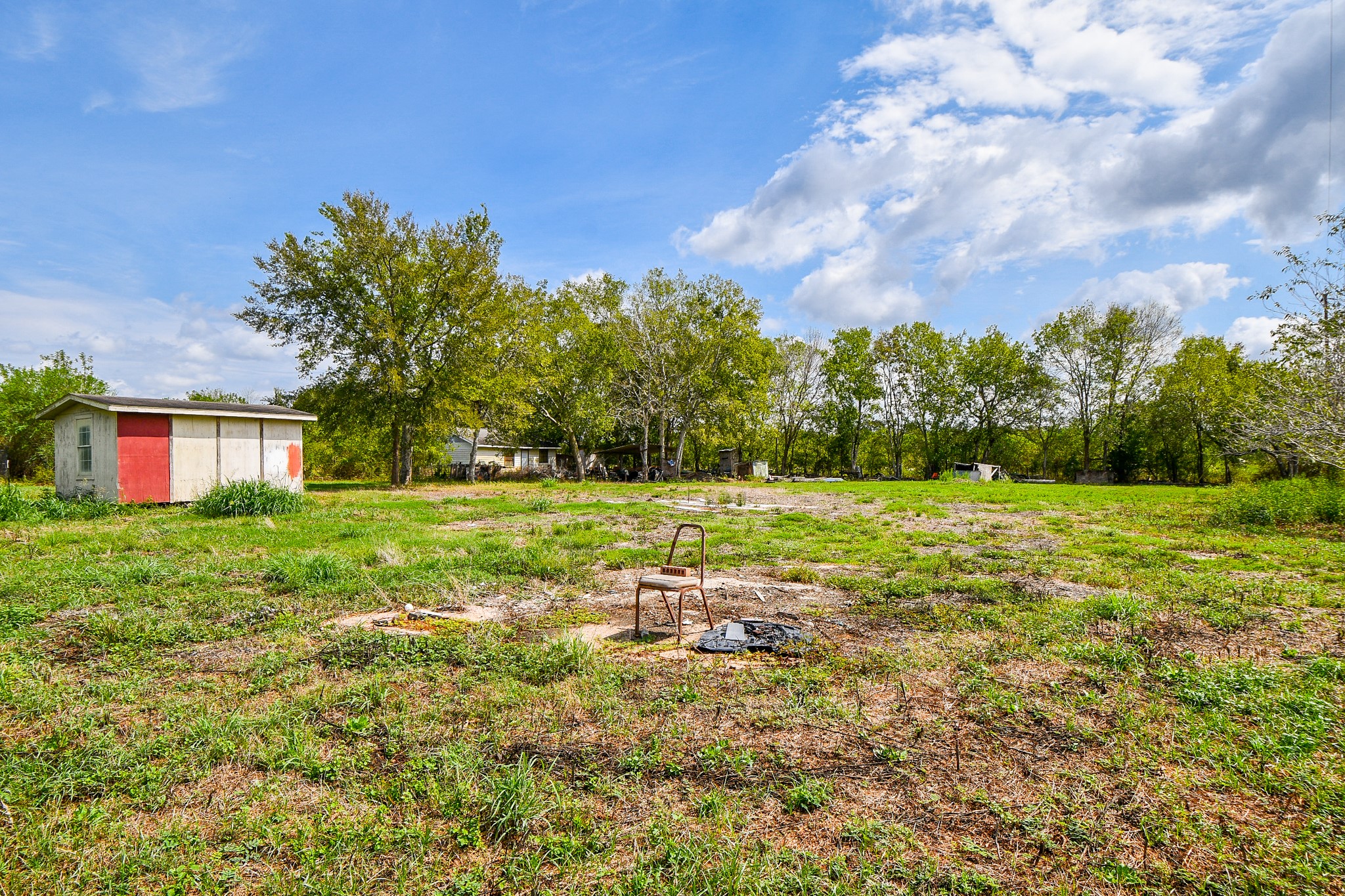11601 FM 2759 Road Richmond, TX 77469 - Photo 14 of 25 a backyard of a house with lots of green space