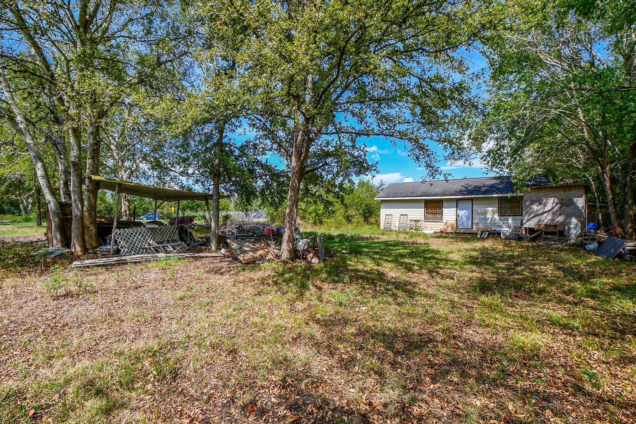11601 FM 2759 Road Richmond, TX 77469 - Photo 18 of 25 a view of a house with a yard