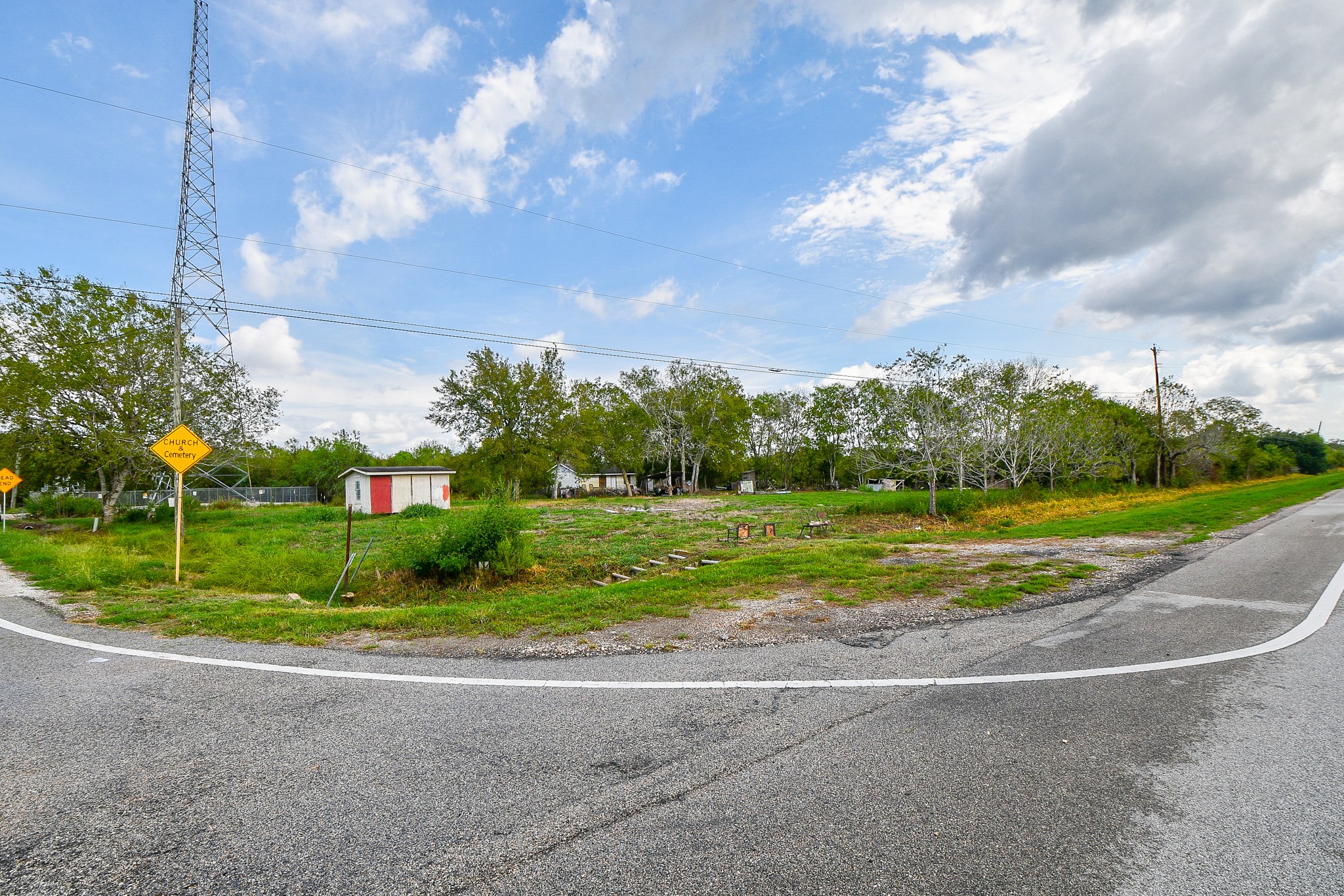 11601 FM 2759 Road Richmond, TX 77469 - Photo 7 of 25 a view of a house with big yard plants and large trees