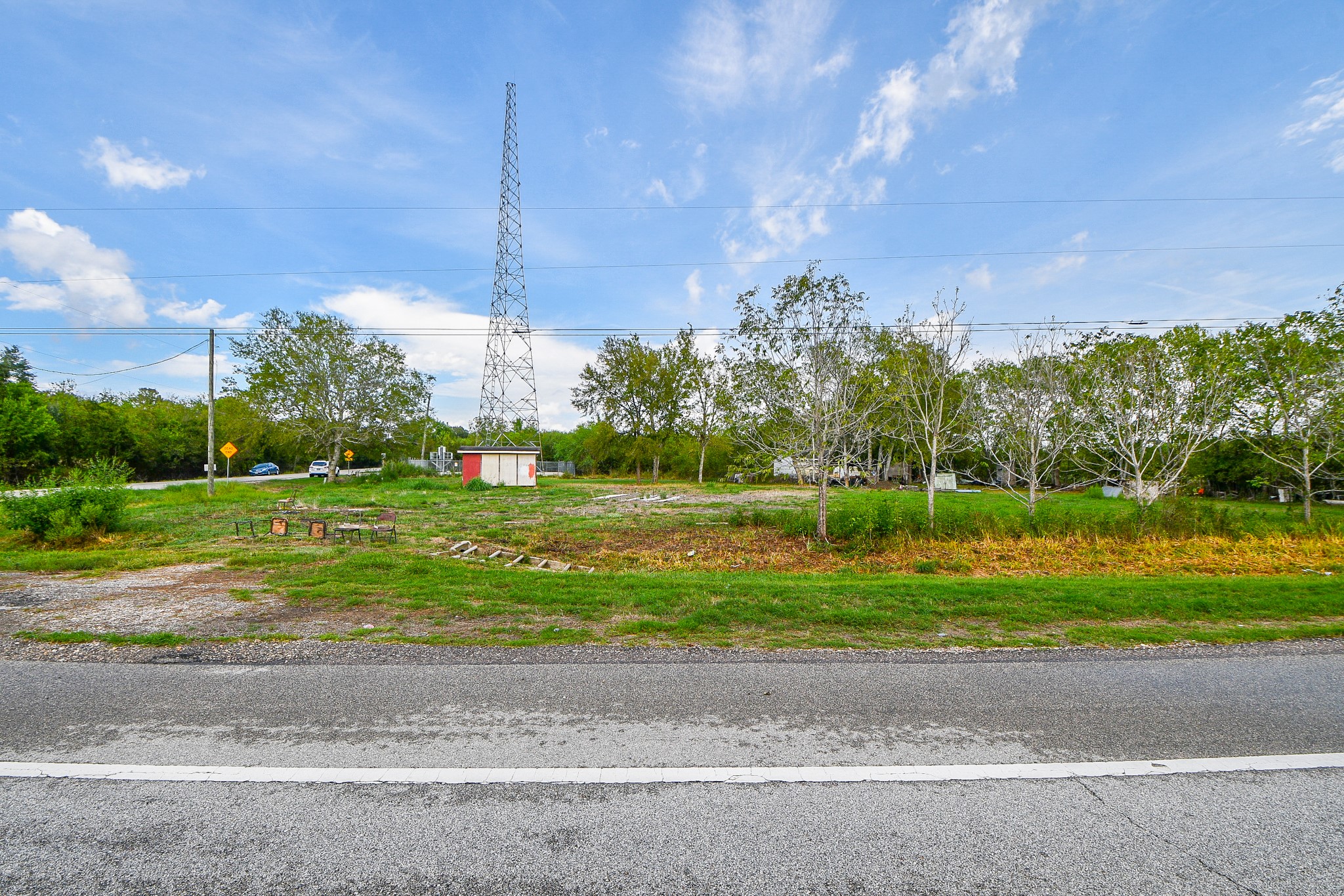 11601 FM 2759 Road Richmond, TX 77469 - Photo 9 of 25 a view of a yard with plants and large trees