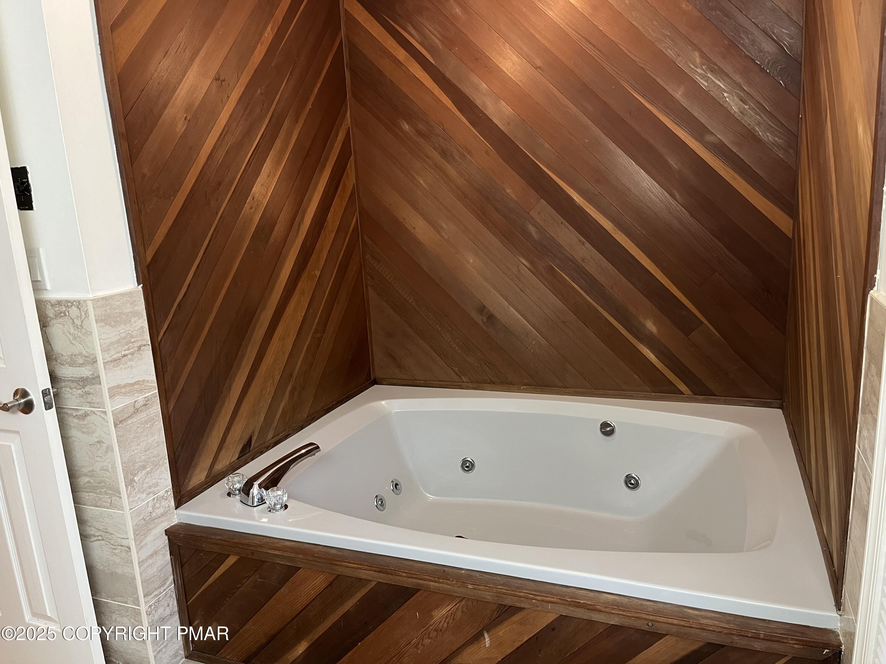 5031 Woodbridge Drive East Bushkill, PA 18324 - Photo 16 of 17 a bathroom with a bathtub