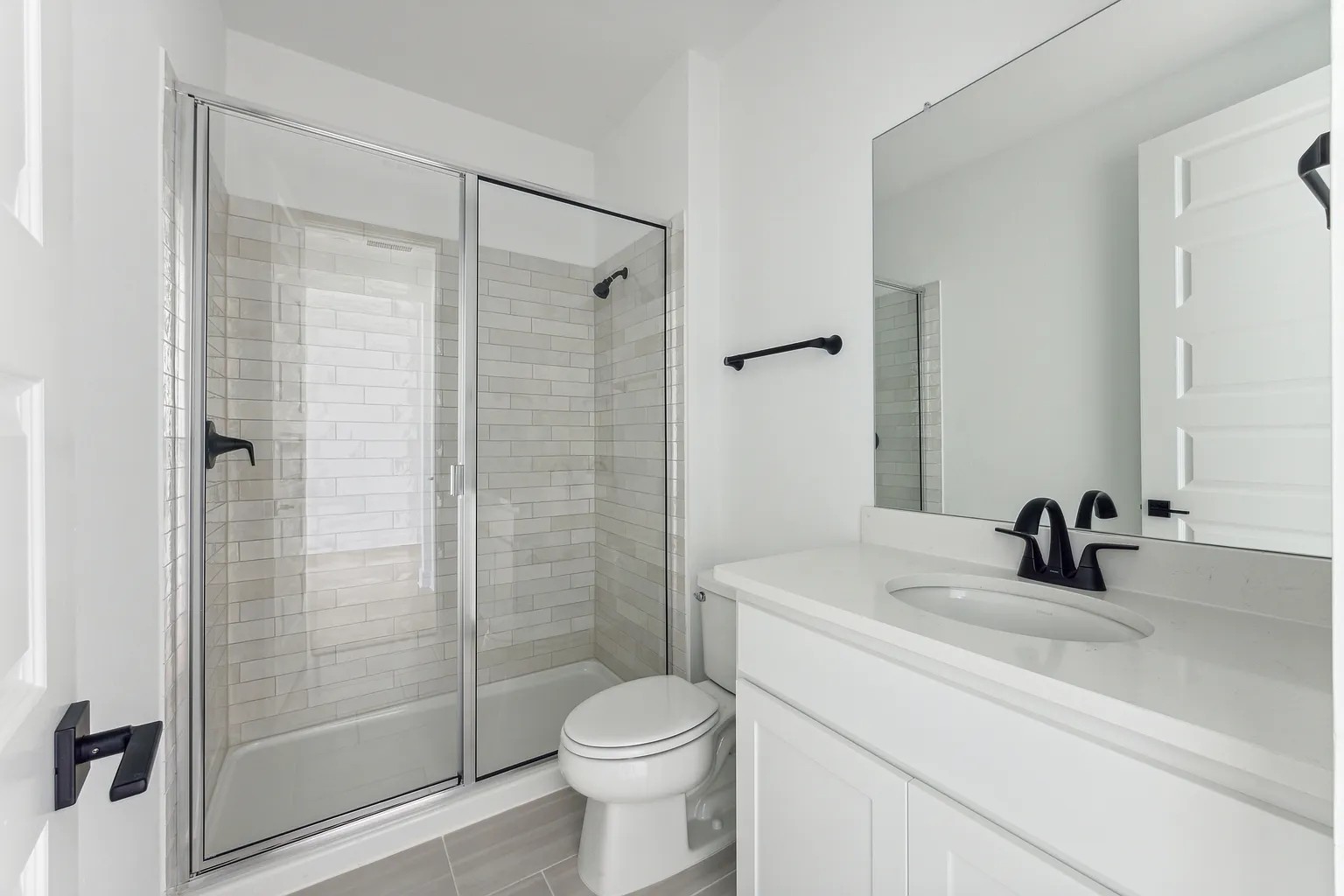 1909 Varese Path Leander, TX 78641 - Photo 37 of 40 A well-appointed bathroom featuring a clean, modern design and essential amenities.