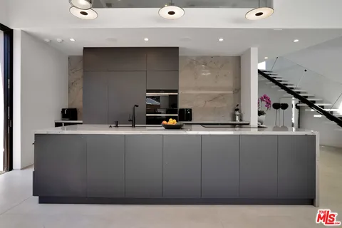 a view of kitchen with stainless steel appliances