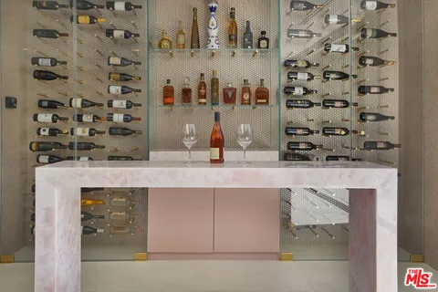 a bathroom with a sink and vanity