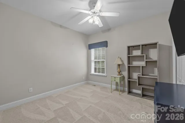 a view of workspace with furniture and cabinet