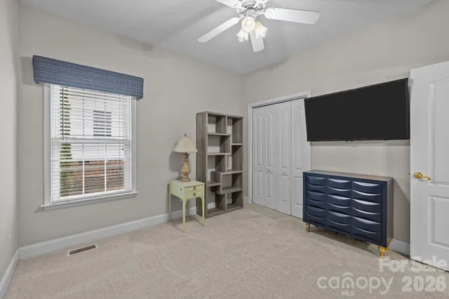 a view of livingroom with furniture and chandelier