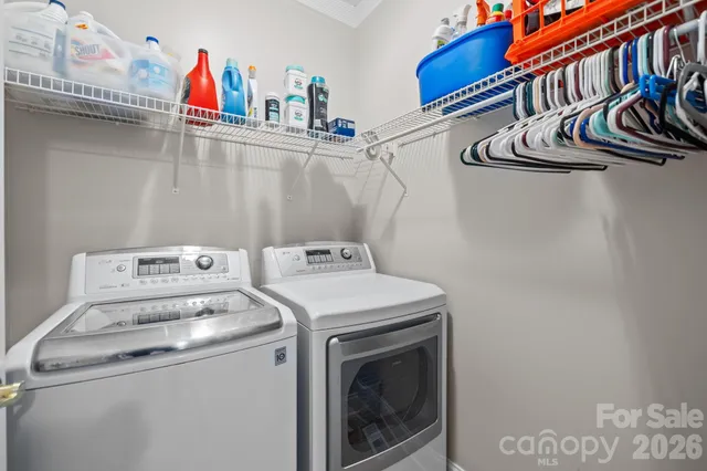 a utility room with dryer and washer