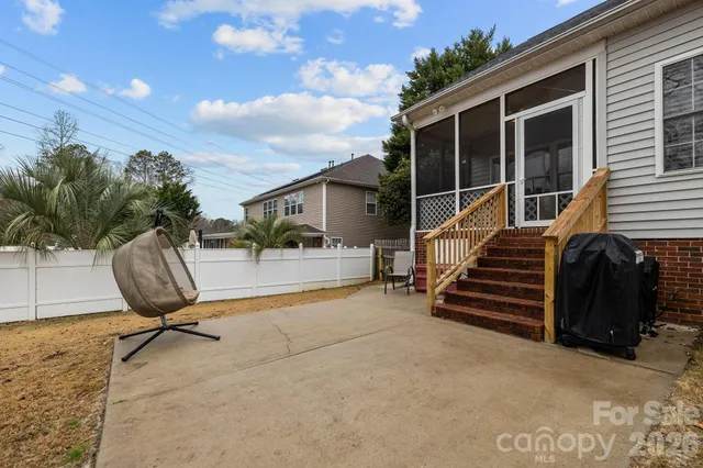 a view of swimming pool with an outdoor space and seating area