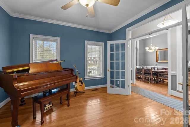 a room with furniture and chandelier