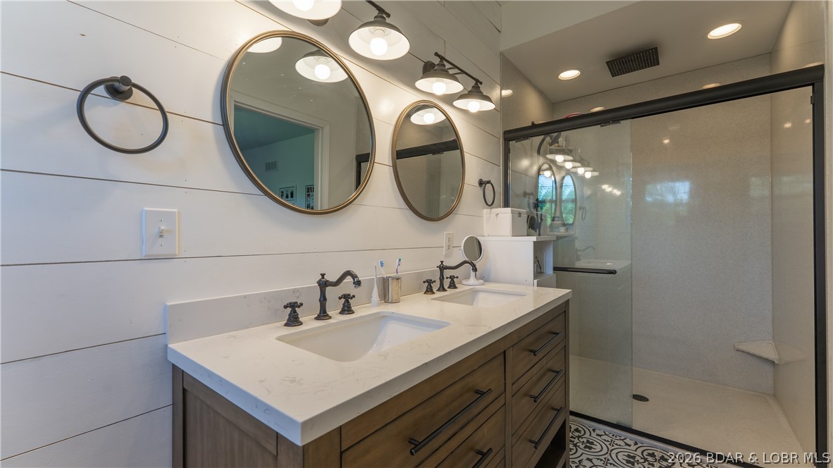 21 Winston Lane Kaiser, MO 65047 - Photo 11 of 45 Double sinks with custom walk in shower