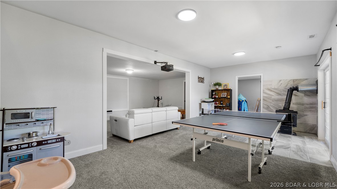 21 Winston Lane Kaiser, MO 65047 - Photo 21 of 45 Versatile space on lower level