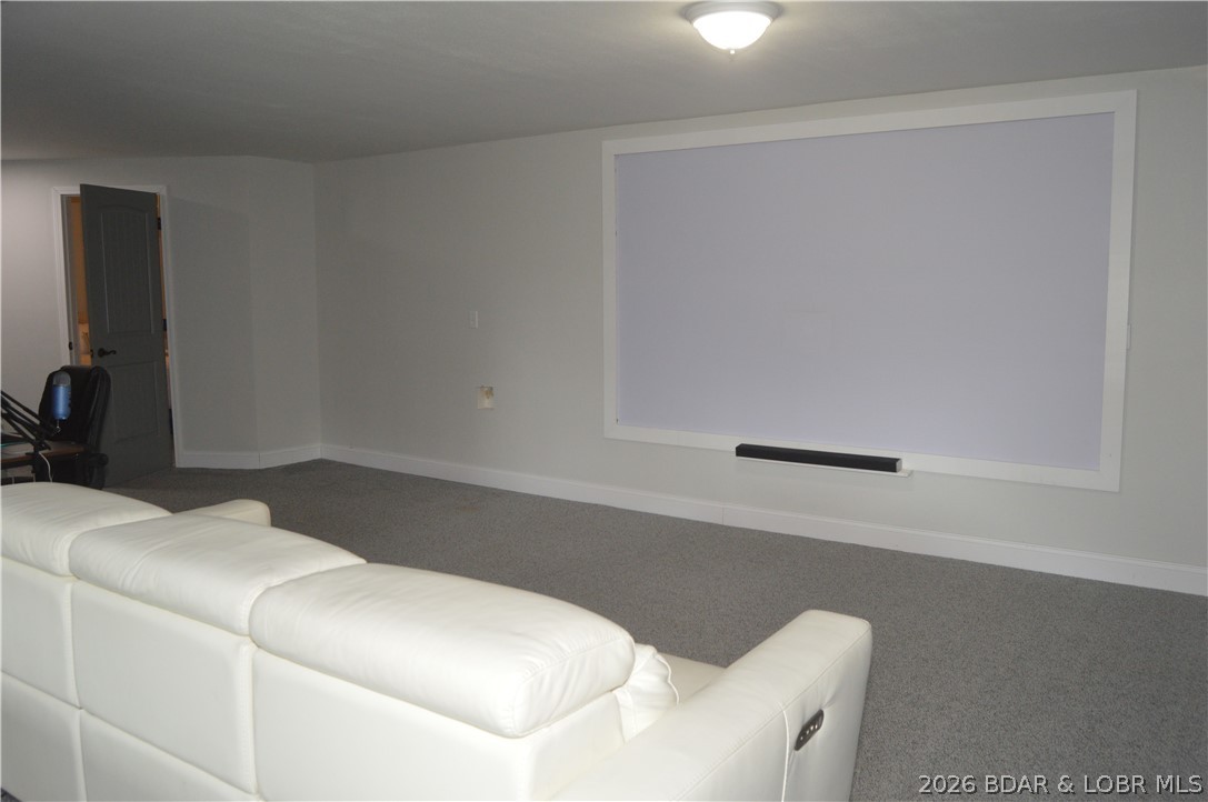 21 Winston Lane Kaiser, MO 65047 - Photo 25 of 45 Large screen for movie night!