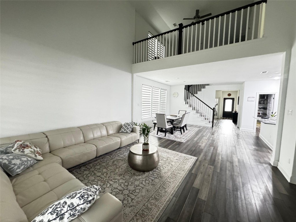 302 Georgia Lace Trail Georgetown, TX 78626 - Photo 5 of 21 a living room with furniture and a wooden floor