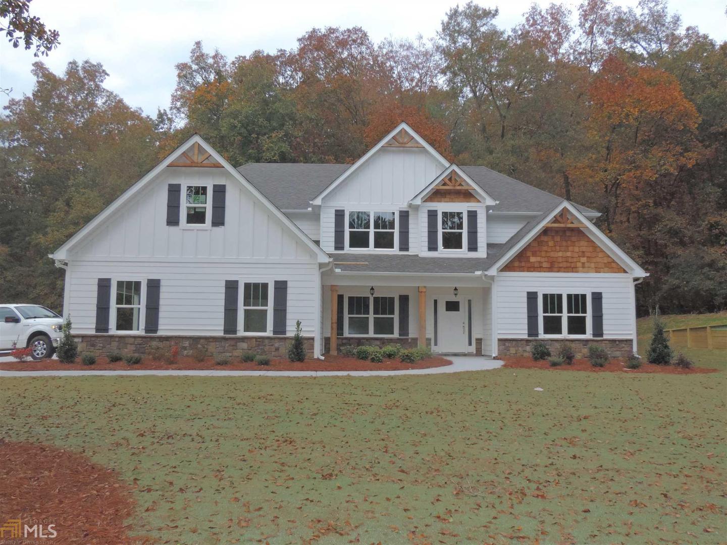 197 Mask Road Brooks, GA 30205 - Photo 1 of 1 a front view of a house with a yard