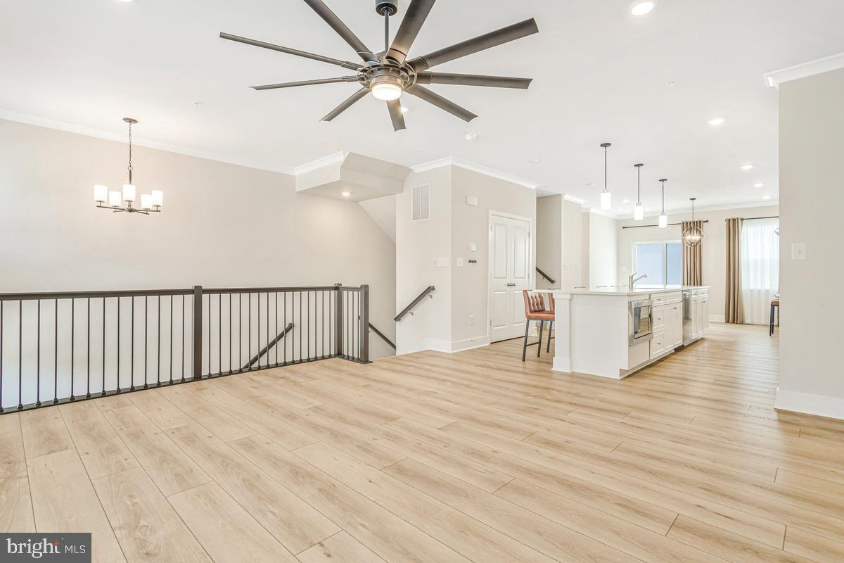 23606 Crosswinds Way California, MD 20619 - Photo 40 of 40 Open floor plan living room and kitchen