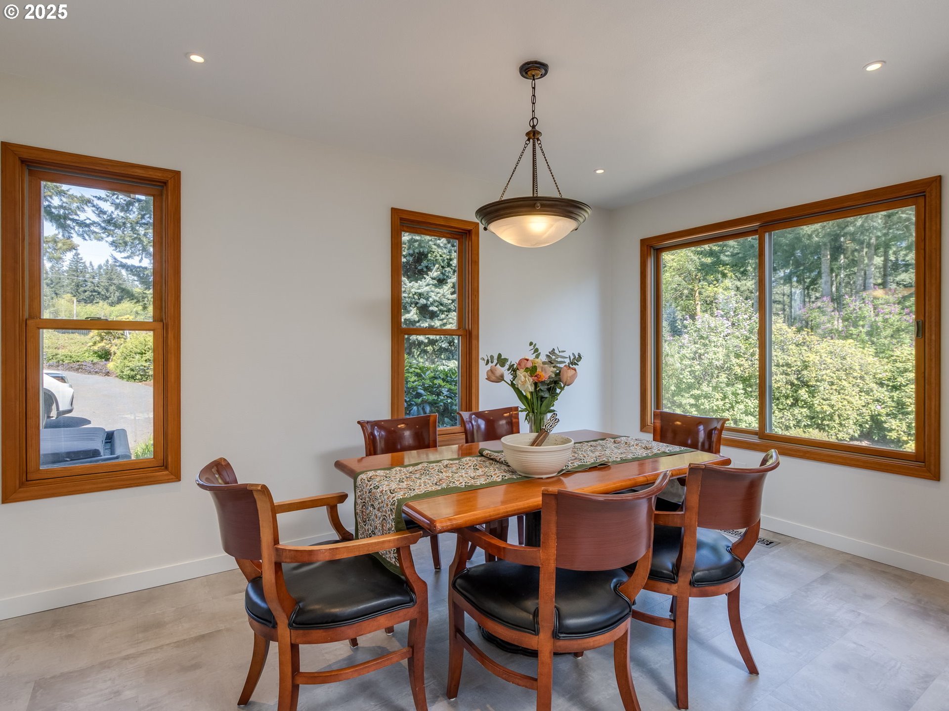 12720 South Carus Road Oregon City, OR 97045 - Photo 12 of 41 a view of a dining room with furniture window and outside view