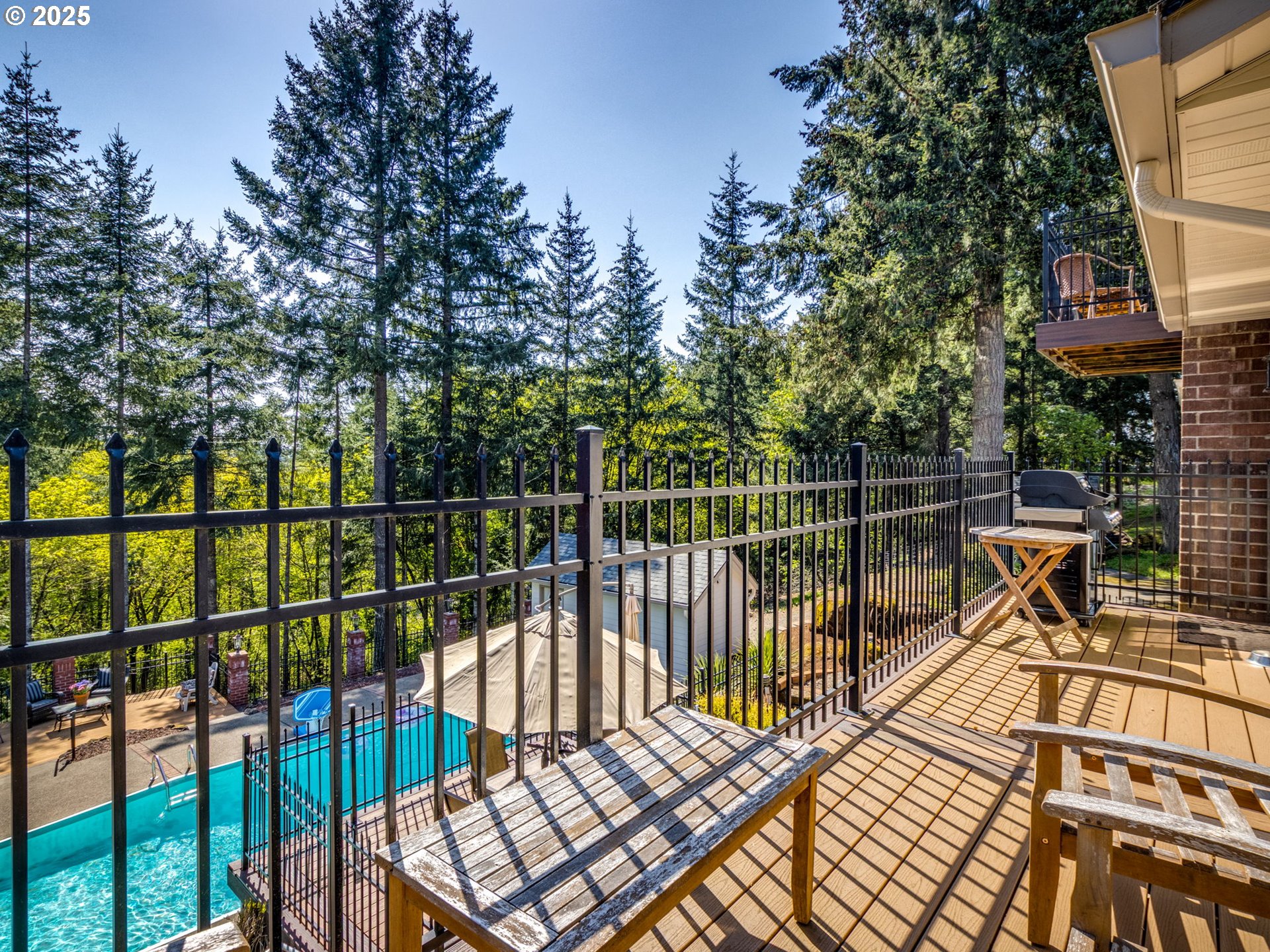 12720 South Carus Road Oregon City, OR 97045 - Photo 18 of 41 a view of a balcony with wooden floor and fence
