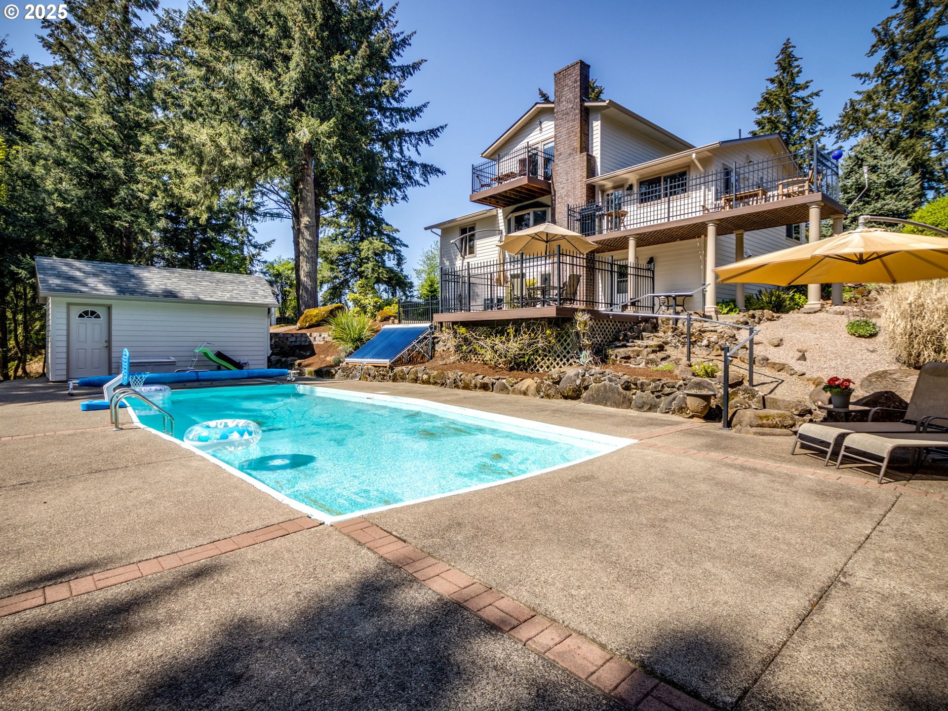 12720 South Carus Road Oregon City, OR 97045 - Photo 25 of 41 a view of a house with entertaining space