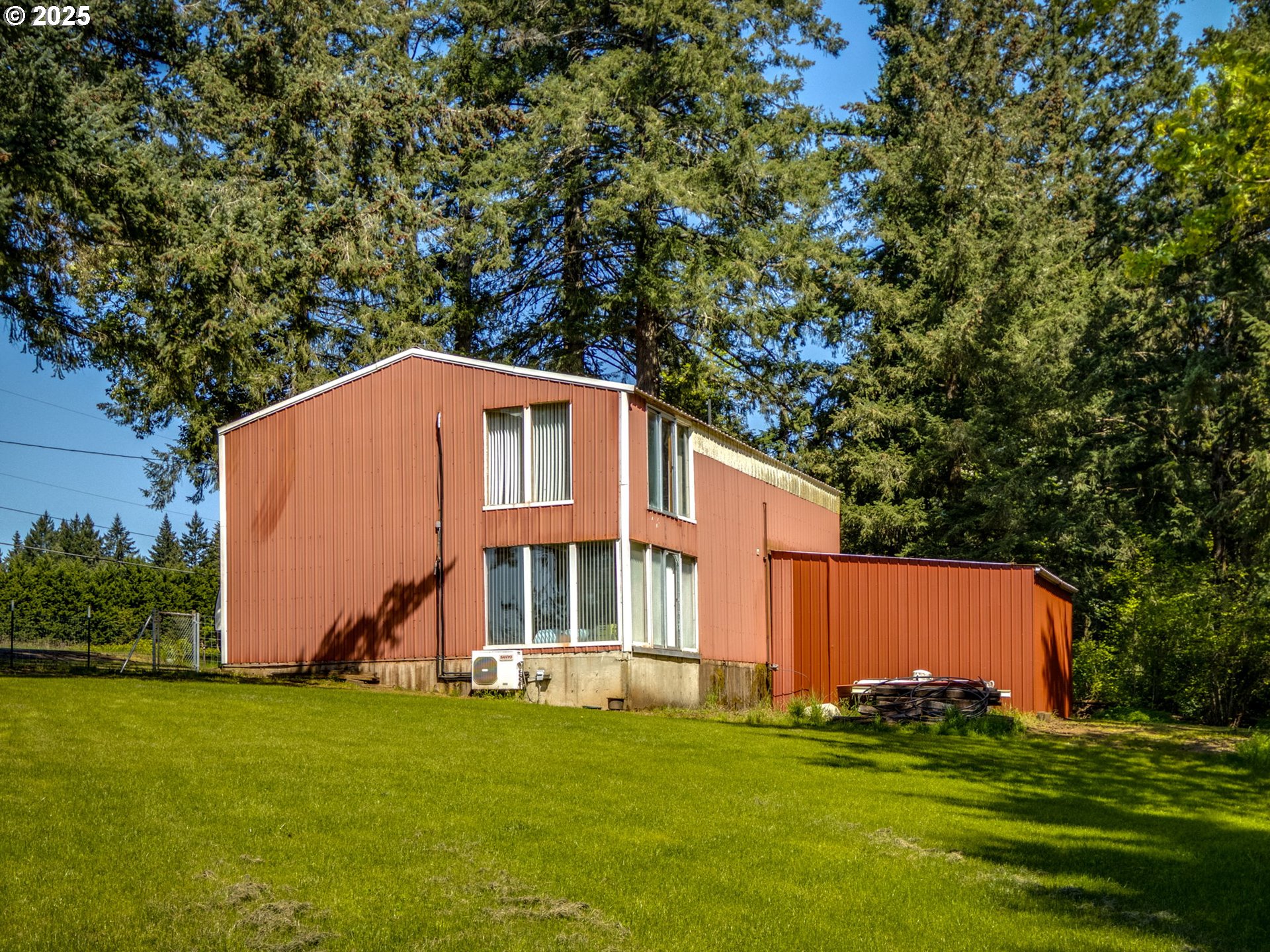 12720 South Carus Road Oregon City, OR 97045 - Photo 35 of 41 a backyard of a house with lots of green space