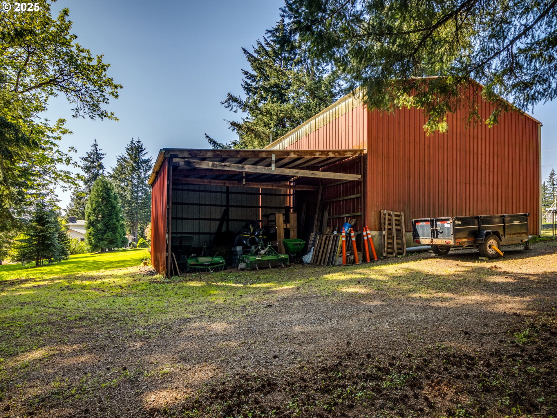 12720 South Carus Road Oregon City, OR 97045 - Photo 38 of 41 a view of a house with backyard and trees