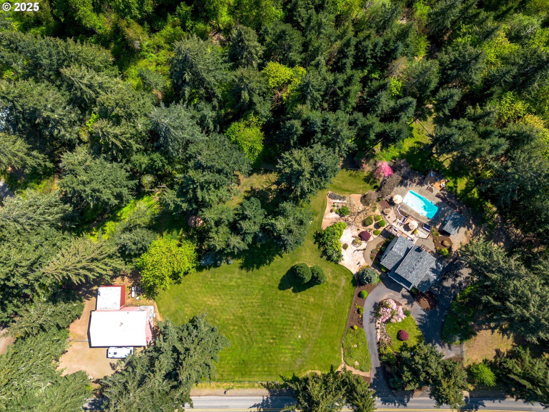 12720 South Carus Road Oregon City, OR 97045 - Photo 40 of 41 an aerial view of residential house with outdoor space and trees all around