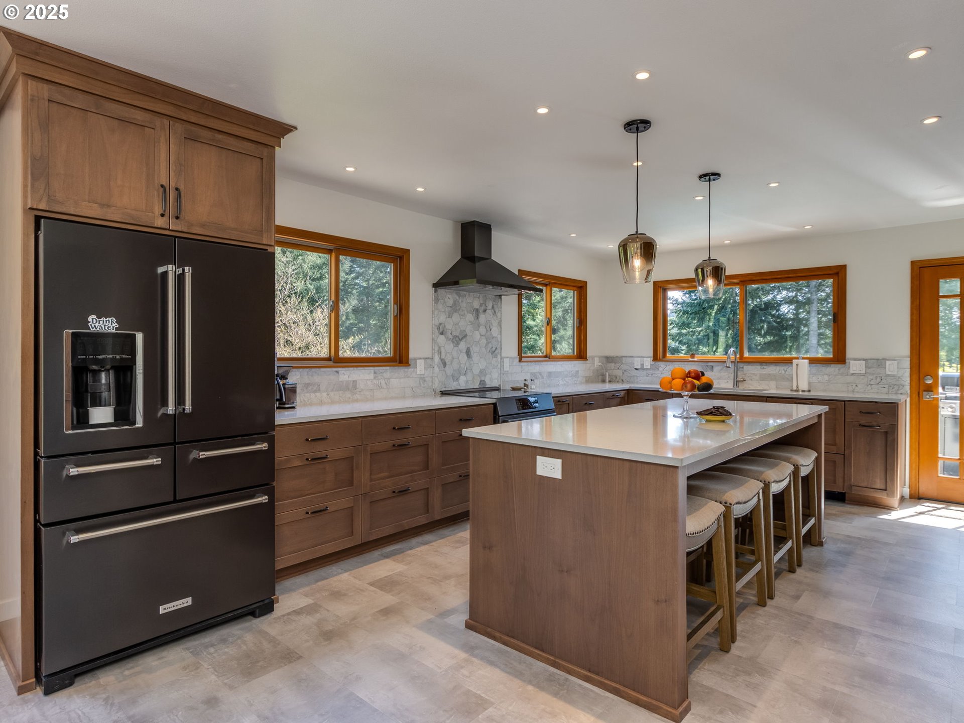 12720 South Carus Road Oregon City, OR 97045 - Photo 8 of 41 a kitchen with stainless steel appliances granite countertop a stove and a sink