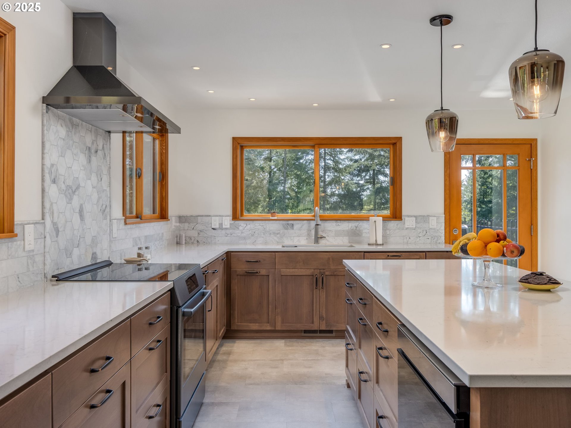 12720 South Carus Road Oregon City, OR 97045 - Photo 9 of 41 a kitchen with stainless steel appliances a sink stove and cabinets
