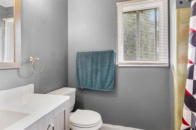 a house view with a backyard space