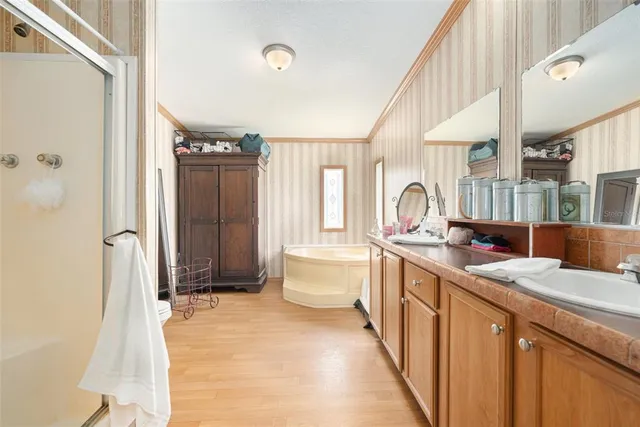 a kitchen with a sink stove and refrigerator