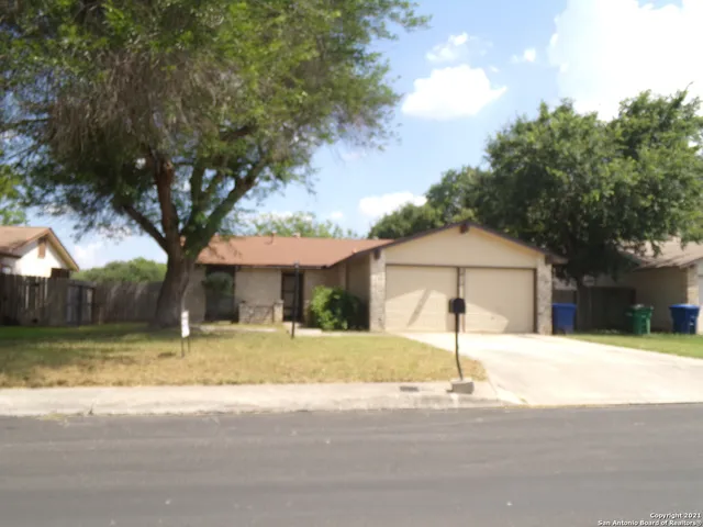 a house with trees in front of it