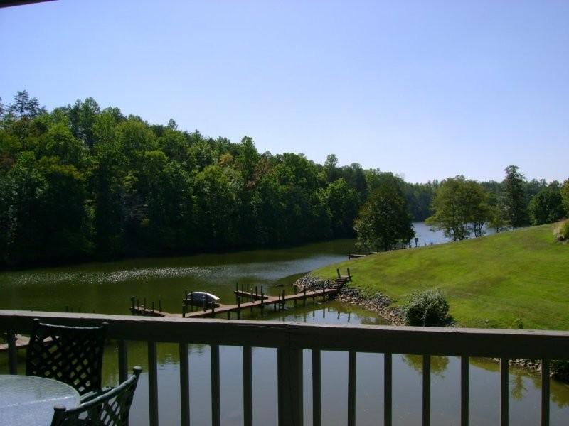 103 Harbor Ridge Drive Goodview, VA 24095 - Photo 5 of 15 a view of a deck with a yard
