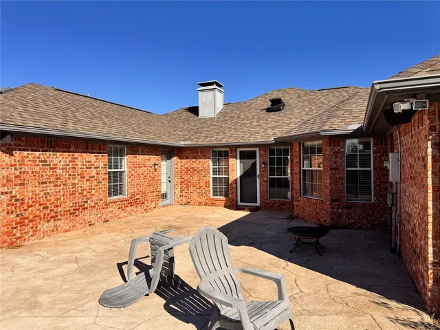 a white bath tub sitting next to a window