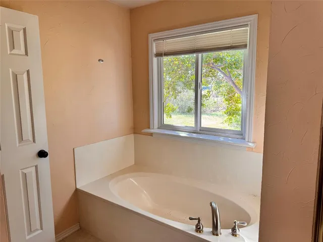 a living room with a fireplace
