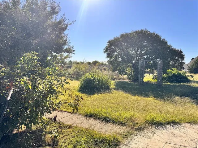 a view of swimming pool with a patio